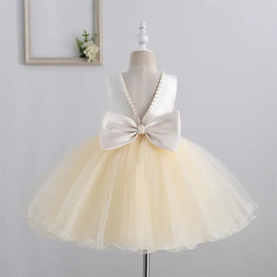 Robe cérémonie fille crème avec perles et jupe en tulle