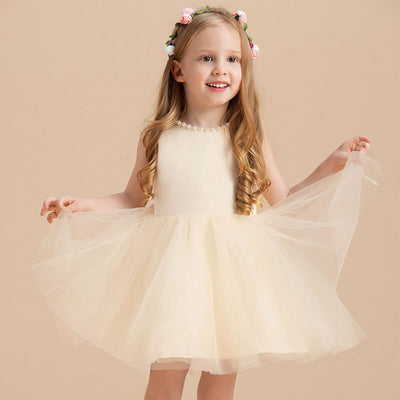 Robe cérémonie fille crème avec perles et jupe en tulle