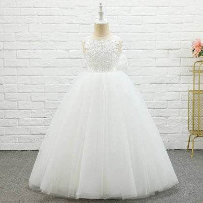 Robe cérémonie fille blanche avec broderies et jupe volumineuse en tulle