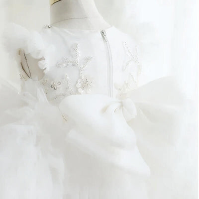 Robe baptême bébé fille blanche avec broderies florales et volants en tulle