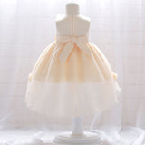 Robe princesse bébé crème avec fleurs en relief et nœud à l'avant