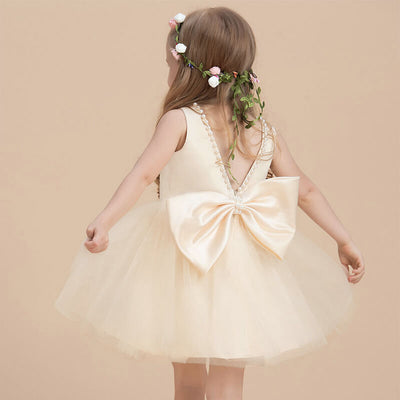 Robe cérémonie fille crème avec perles et jupe en tulle