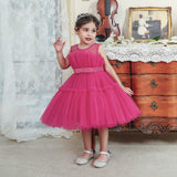 Robe princesse fille rose vif avec corsage à plis et ruban à la taille
