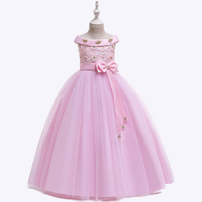 Robe princesse fille blanche avec corsage en dentelle fleurie et jupe en tulle volumineuse