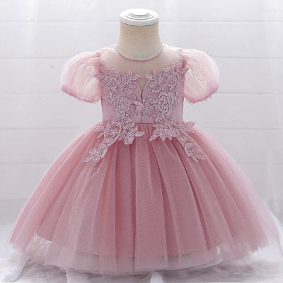Robe baptême bébé fille blanche avec manches bouffantes et broderies florales