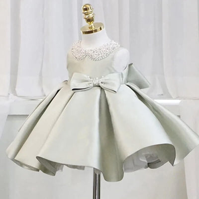 Robe cérémonie fille gris pâle avec col orné de perles et grand nœud décoratif
